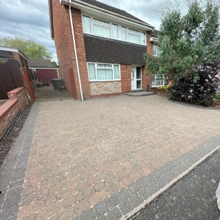 Algae removal from wooden garden fence